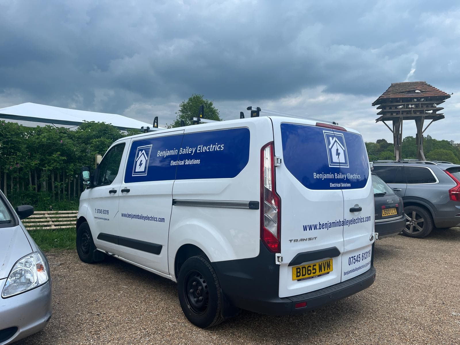 The Benjamin Bailey Electrics branded van parked at a customer property, ready for an EV charger installation.